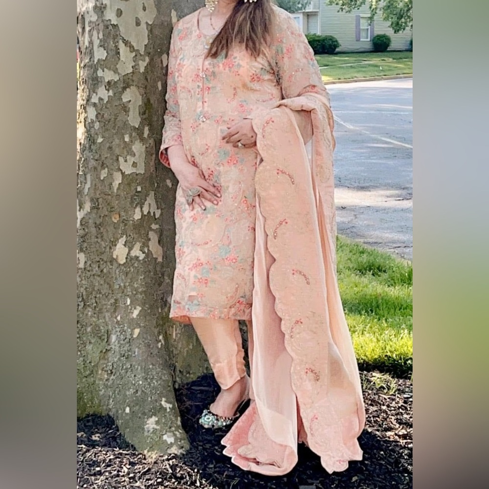 Pakistani Designer Breeze peach color Embroidered Suit